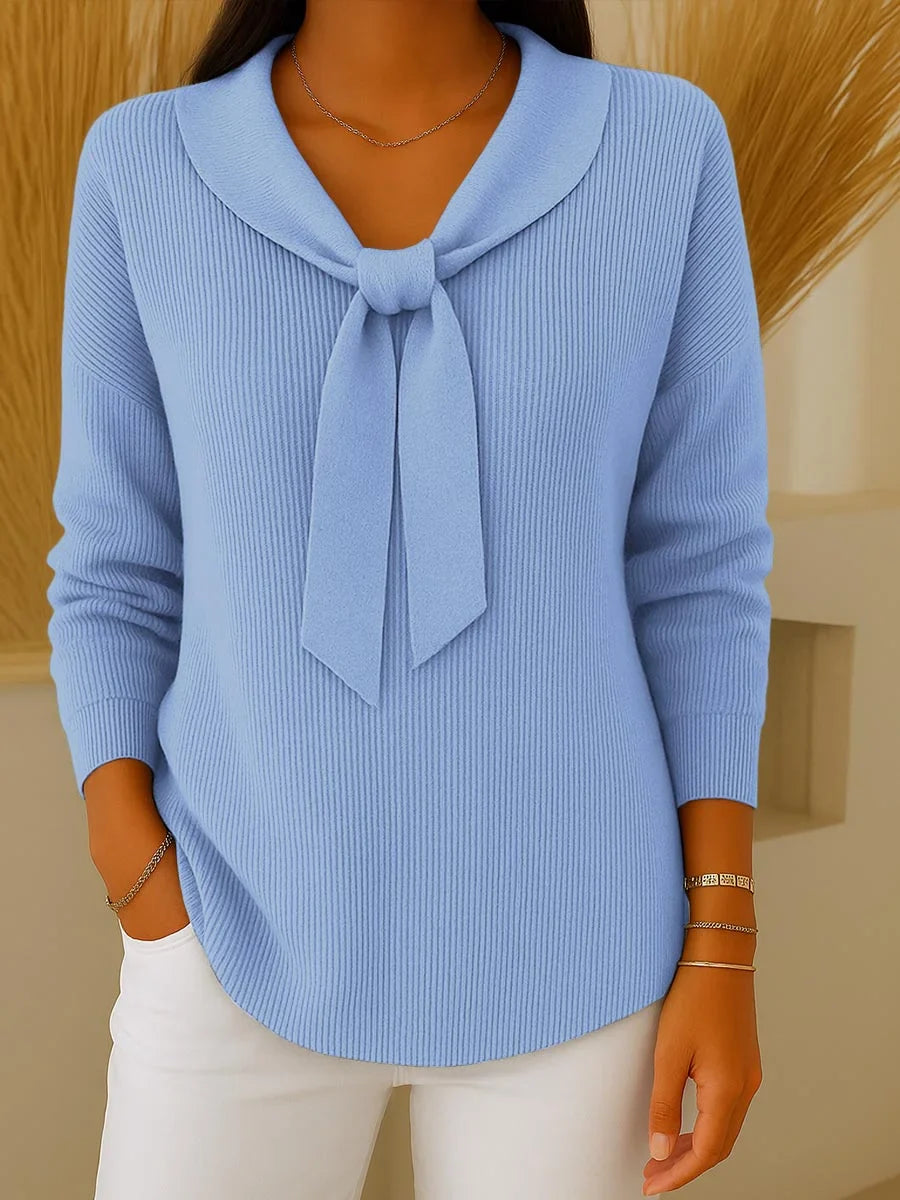Women’s solid sweater with tie and long sleeves.